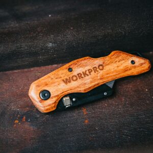 Close-up of a Workpro folding knife with wooden handle, perfect for camping and outdoor use.